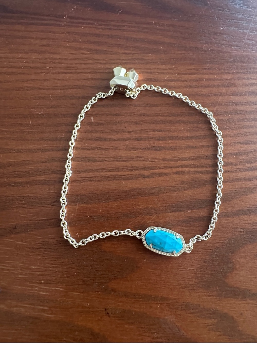 Kendra scott Elaina gold adjustable chain with turquoise blue center